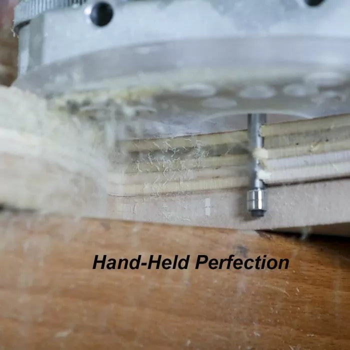Close-up of a handheld router with a straight bit trimming plywood edge for woodworking precision.