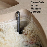 Router bit making precision cuts in plywood with wood shavings in tight corner
