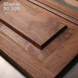 Shaker style walnut cabinet door panel with clean lines and smooth wood grain