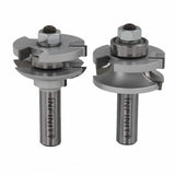 Two steel router bits with bearings for woodworking joinery on white background