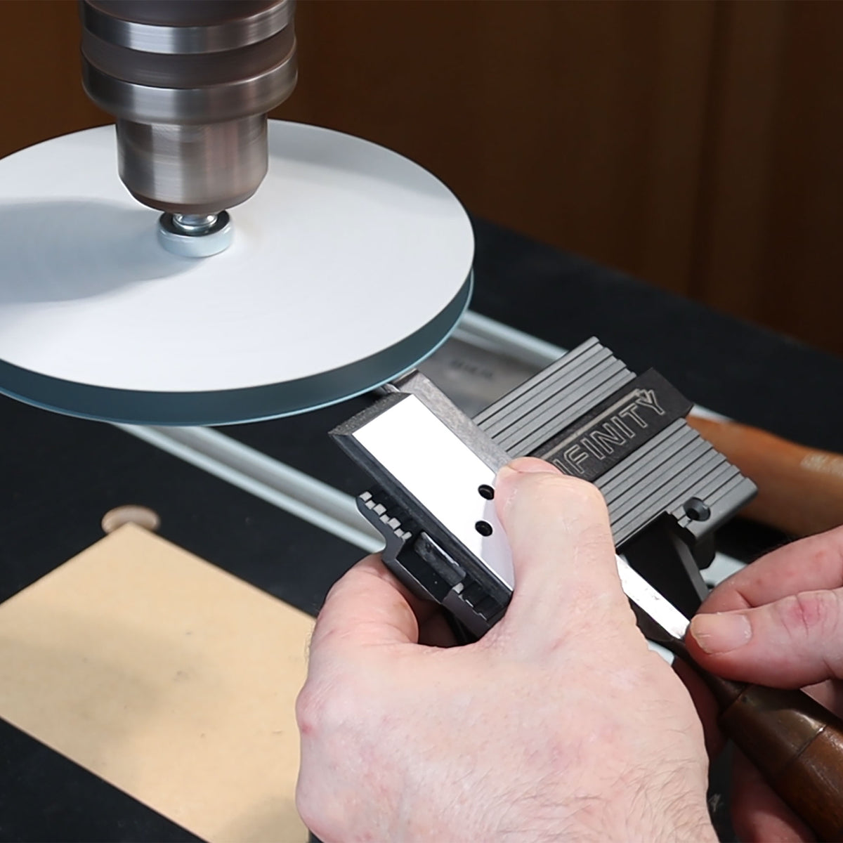 Sharpening a chisel on the Infinity Tools Drill Press Sharpening Station