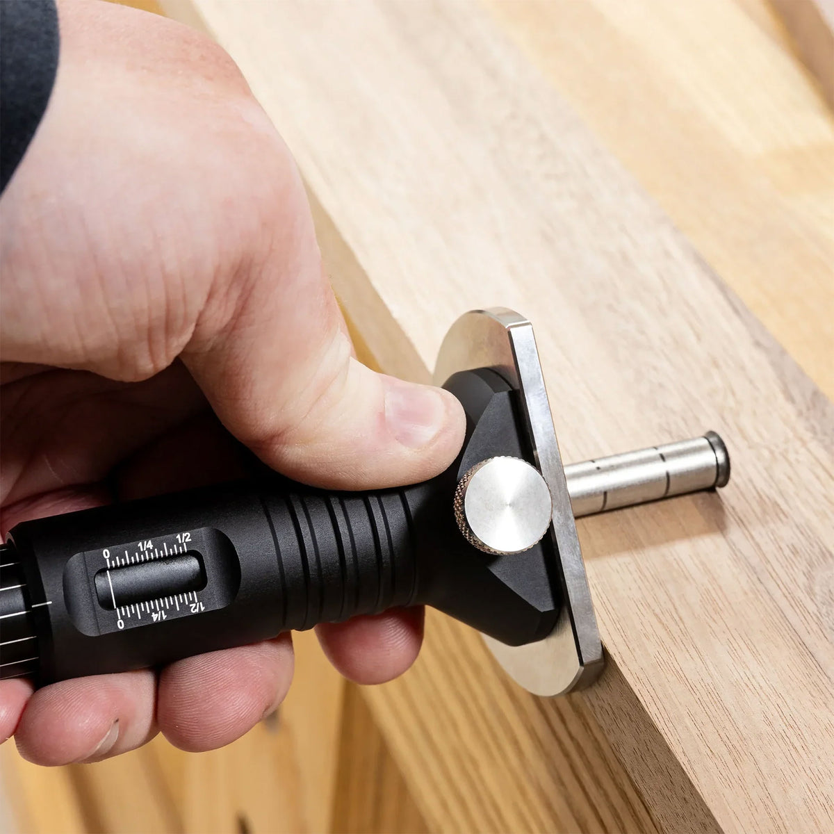 hand holding a jessem measuring gauge