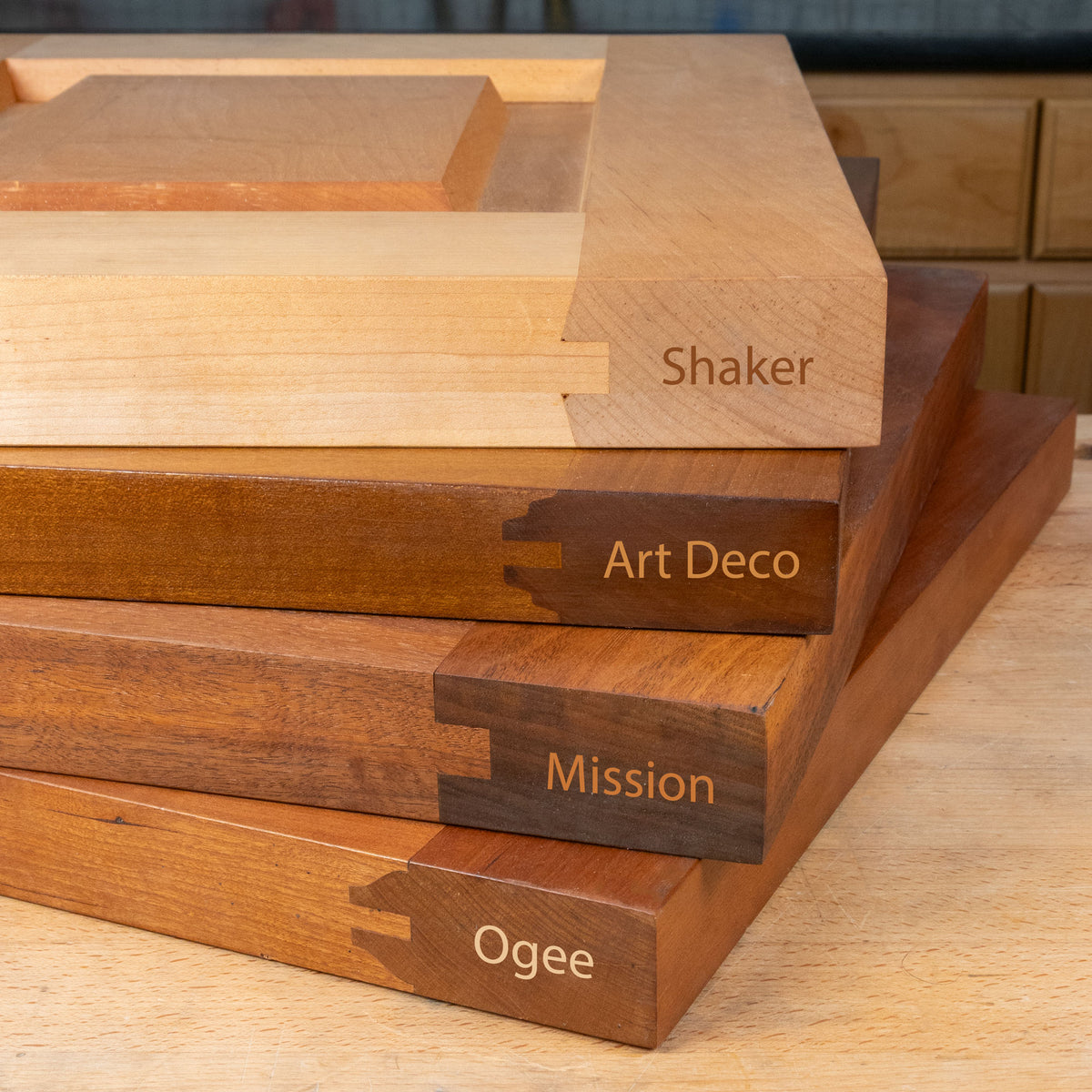 Stack of four woodworking profiles labeled Shaker, Art Deco, Mission, and Ogee styles