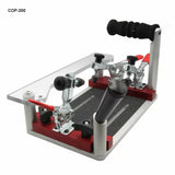 Woodworking jig with toggle clamps, handle, and non-slip base on white background