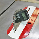 Digital angle gauge measuring table saw blade bevel angle on metal surface