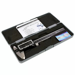 Digital caliper measuring tool kit with instructions and battery in foam-lined case