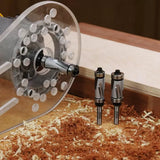 Woodworking router with flush trim bits and wood shavings on workbench