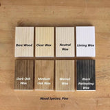 Pine wood samples showing finishes: bare, clear wax, neutral wax, liming wax, dark oak, medium oak, walnut, and black patinating wax.