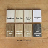 Poplar wood samples showing finishes: bare, clear wax, neutral wax, liming wax, dark oak, medium oak, walnut, and black patinating wax.