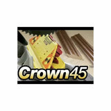 Crown45 woodworking jig guide on saw table with crown molding pieces