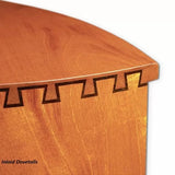 Close-up of inlaid dovetail joinery on polished wood box corner for woodworking precision