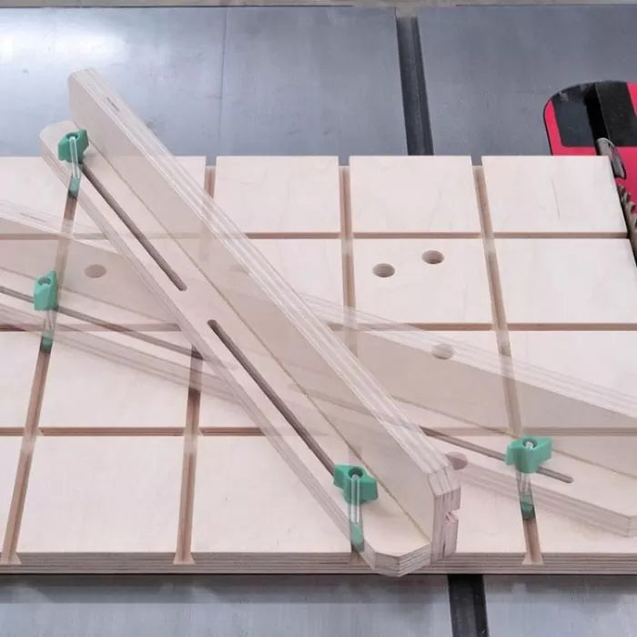 Woodworking crosscut sled with adjustable fences and T-track clamps on a table saw
