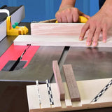 Woodworker using table saw with sled and push block for precise wood cutting.