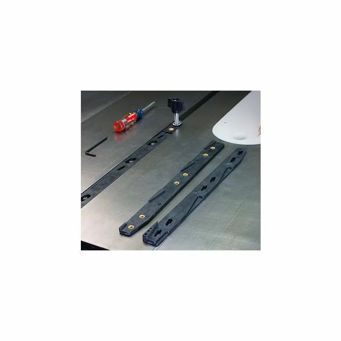 Router table miter slot runners and hardware set on metal work surface for woodworking jigs