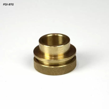 Brass router table guide bushing with knurled edge on white background