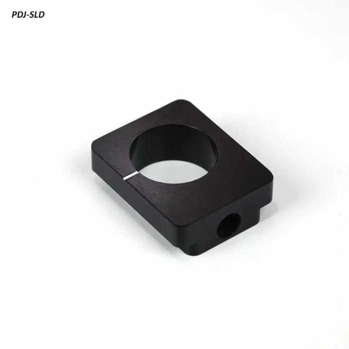 Black metal woodworking jig stop block with center hole on white background