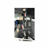 Precision planer height gauge with adjustment knobs on woodworking machine