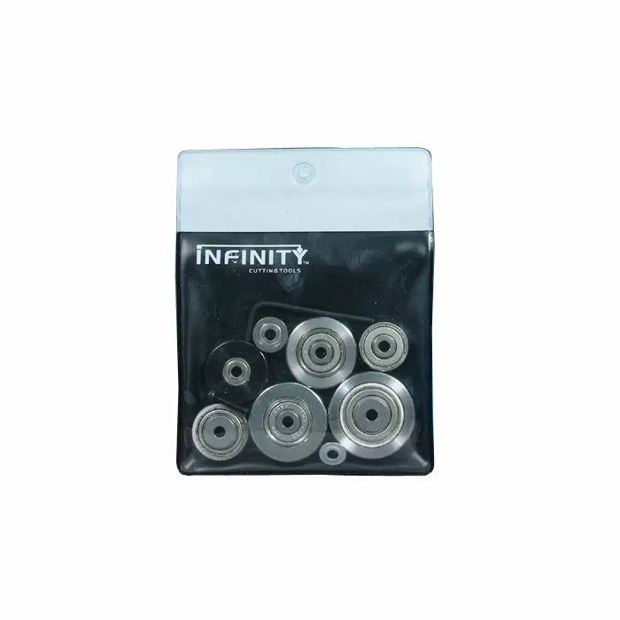 Set of metal router bit bearings in clear plastic pouch for woodworking tools