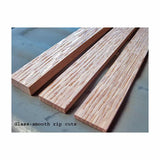 Smoothly cut wooden boards with glass-smooth rip cuts on a work surface for woodworking projects.